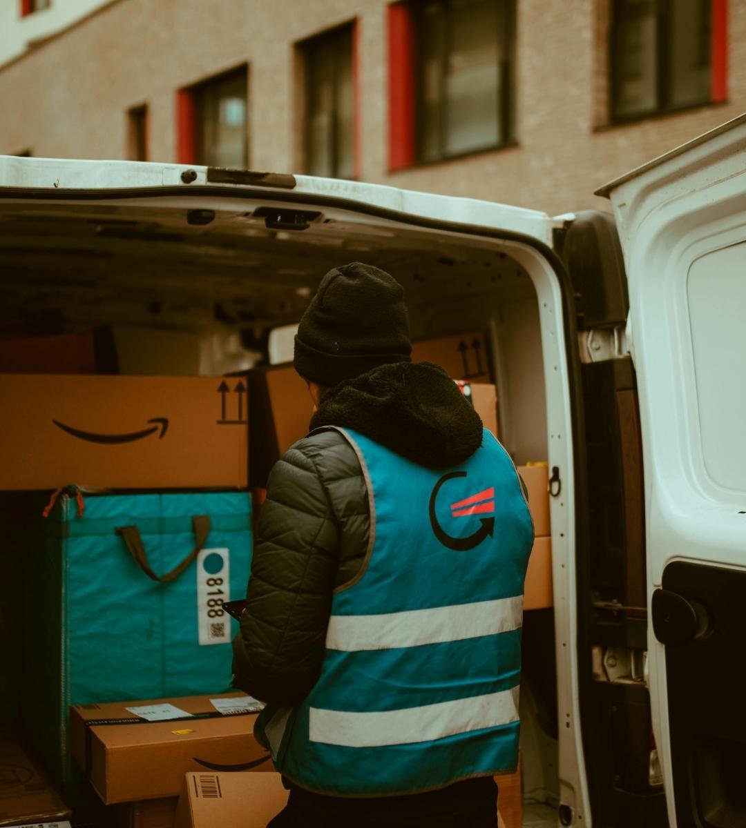 A workers standing or loading Our Man and Van Service